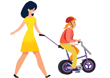 A girl on a trike being pushed by another person